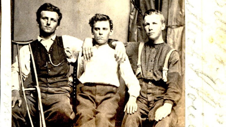William Keevan (right), John Bullock, and J. Joyce. "Some of 'The Boys'" is handwritten below the photograph